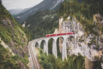 Wall murals Landwasser Viaduct Swiss red train on viaduct in mountain, scenic ride