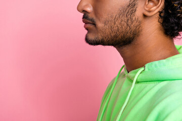 Side profile cropped photo unshaven unrecognizable indian serious man looking copy space skincare...