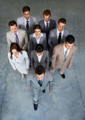 Top view, team of business people and leadership of man walking in office, staff cooperation or...