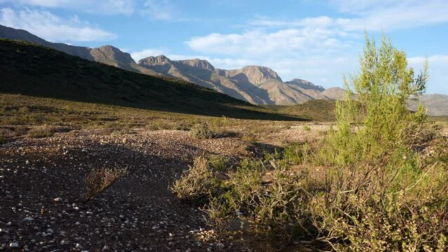4k 30p footage of the beautiful Swartberg Mountains near the tiny hamlet of Klaarstroom at the northern entrance to Meiringspoort. Karoo. Western Cape. South Africa.