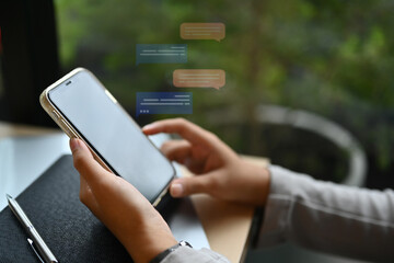 Closeup woman using social media, commenting and sharing posts commenting on mobile phone