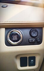 automatic buttons on vehicles such as the engine start and stop button and the rearview mirror control button