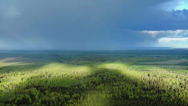 A dense wall of rain, a downpour is coming. Aerial Drone Shot.