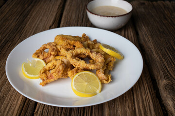 fried calamari and lemon slices