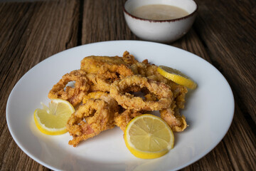 fried calamari and lemon slices