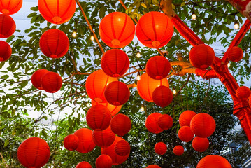 Many red lanterns hanging in Vietnam for Tet Lunar New Year