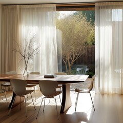 Spacious dining area with a large table, designer chairs, and sheer curtains diffusing sunlight