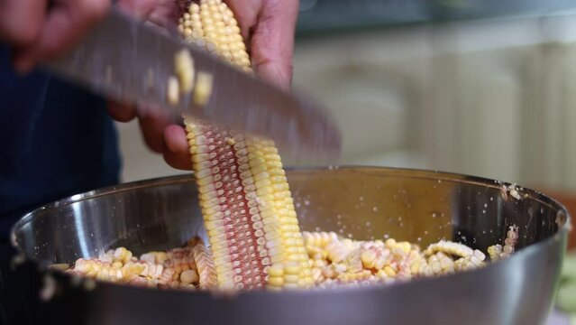 Artisanal preparation of corn cachapas, a typical Venezuelan dish.