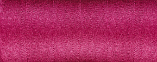 texture of threads for a sewing machine red colors on a white background