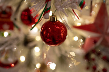 A beautifully decorated Christmas tree with sparkling lights and colorful ornaments, embodying the festive spirit