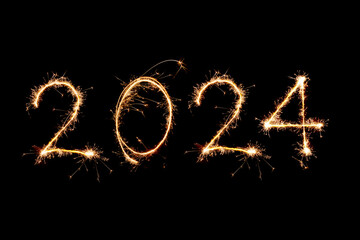 2024 written with Sparkle firework on black background, happy new year 2024 concept