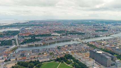 Fototapeta na wymiar Copenhagen, Denmark. Copernhagen lakes. Panorama of the city center in cloudy weather. Summer day, Aerial View