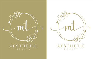 Letter MT Beauty Logo with Flourish Ornament - obrazy, fototapety, plakaty
