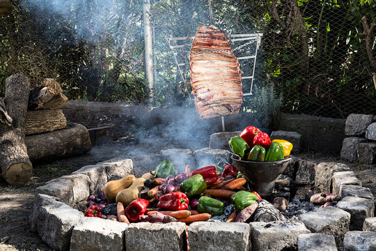 Costillar a la estaca, con verduras al rescoldo