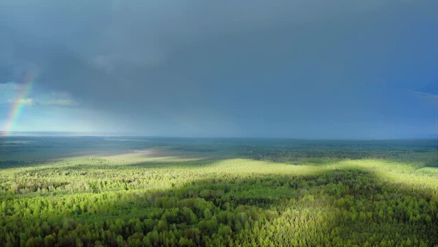 Impending Downpour and Vibrant Rainbow, An Aerial Meteorological Marvel. Aerial Drone Shot.