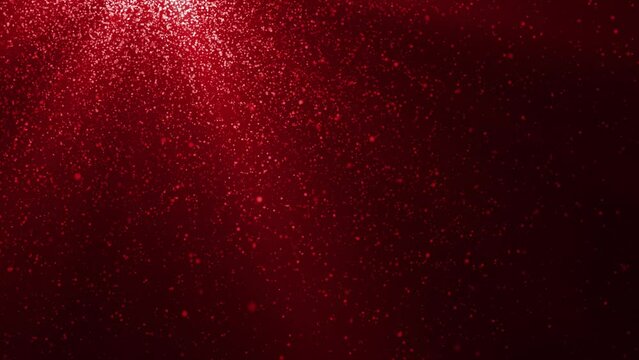 Looped animated abstract background of red light rays and falling particles 