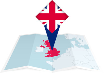 United Kingdom pin flag and map on a folded map