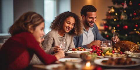 Happy and diverse family in a christmas dinner in a modern home
