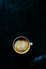 cup of coffee on black