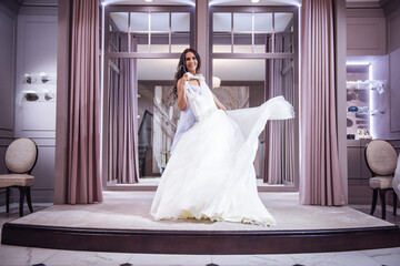 Beautiful bride in wedding salon - Powered by Adobe