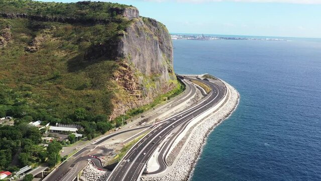 Aerial drone view of the new coastal road Route du Littoral connecting Saint Denis with La Possession, Reunion.