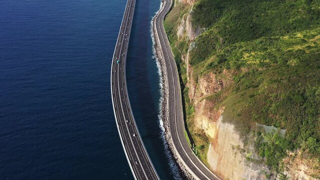 Aerial drone view of the new coastal road Route du Littoral connecting Saint Denis with La Possession, Reunion.