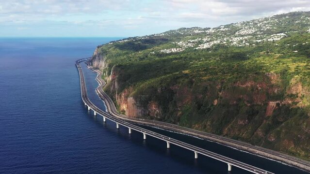 Aerial drone view of the new coastal road Route du Littoral connecting Saint Denis with La Possession, Reunion.