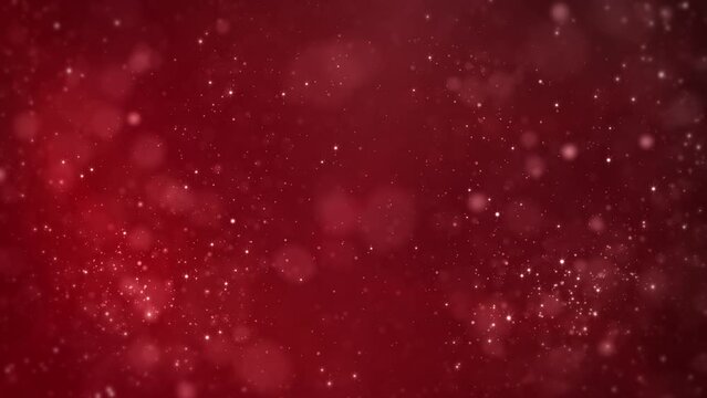 Red background with particles, snowflakes, snowflakes and particles are flying