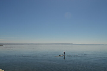 Fototapeta na wymiar doing paddle board in the pacific ocean in Chile