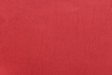 Red paper as a background or texture.