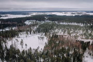 Aerial view of frozen river and dam. Winter landscape. Panorama.