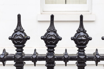 Decorative black railing in urban London - 689682775