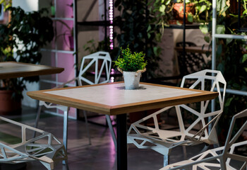 Empty tables of street cafe