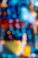 Abstract circular bokeh background of Christmaslight,abstract background. Colorful blurry decorative Christmas lights at night.