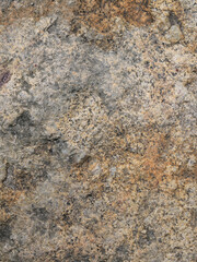 Naklejka premium Red brown rock natural texture for background. Close up cracked mountain surface.