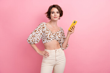 Photo of charming young lady brown hair hold apple iphone advertise new model series gadget summer...