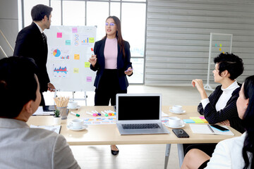 Achievement successful beautiful businesswoman shares experience success, gives presentation at conference meeting desk, businesspeople have discussion about project work in office workplace