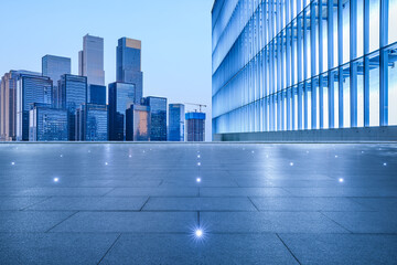 Empty square floor and modern city buildings background