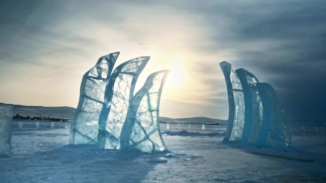 Entrance group of ice sculptures. Gates to winter. An ice sculpture festival on Olkhon Island. A Frosty Tale. Lake Baikal, Siberia, Russia.