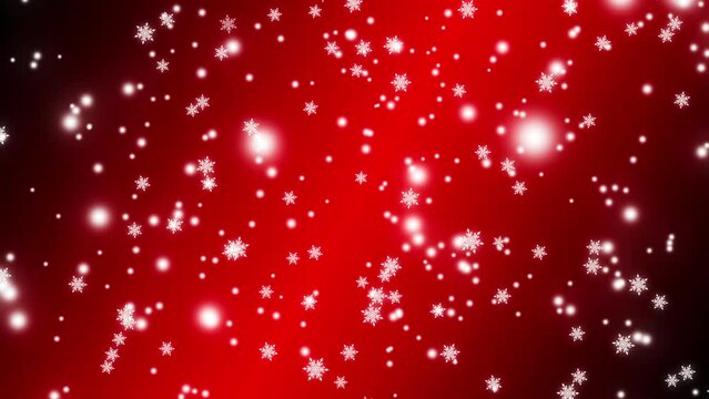 Abstract background with white snowflakes falling slowly from top to bottom on red background. Merry Christmas, Happy New Year, and Happy Holidays greeting. Copy space.
