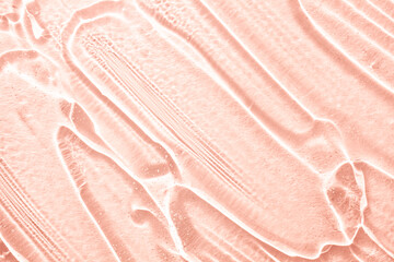 Cosmetic product creamy gel texture pink background