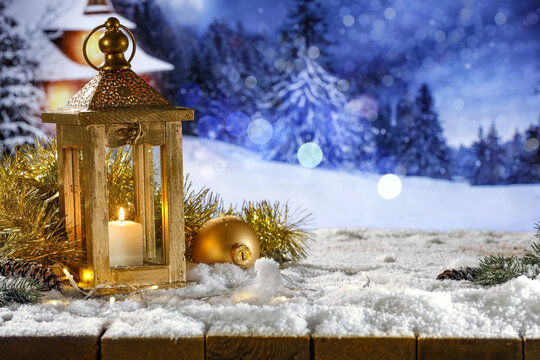 Photo of Christmas tree decoration on wooden table.Empty background of winter time ,christmas card,snow and frost pattern, family time and Happy New Year party, celebration and holidays. 
