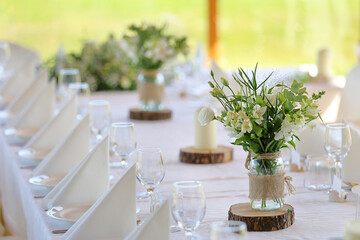 White flowers decorated on the table for event party or wedding reception - 689727540