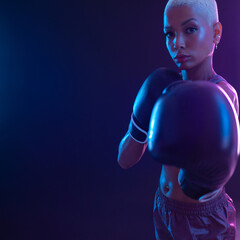 The Boxing. Brazilian woman boxer. Sportsman muay thai boxer fighting in gloves. Isolated on black...