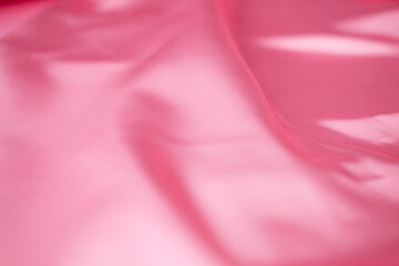 Modern bright pink fabric stripes blurred background