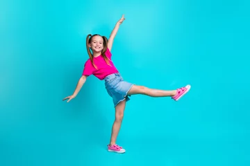 Rolgordijnen Dansschool Full length profile portrait of small positive person dancing walk isolated on turquoise color background
