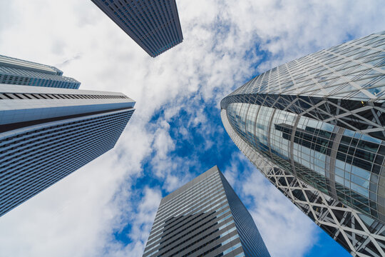 Wide angle of business building with blue sky and cloud