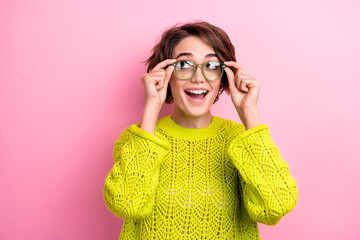 Portrait of young brown hair business woman touching specs glasses for vision help see small size...