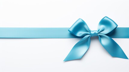 Blue ribbon bow on left of straight ribbon for banner, isolated on white background with copy space