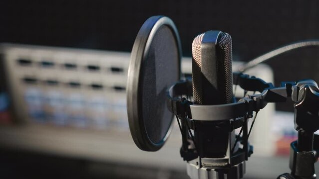 Audio recording studio with microphone
